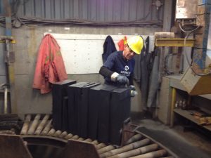 Employee preparing the slate blocks to be sent to the splitting department