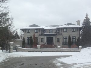 New slate roof tiles installed on custom home